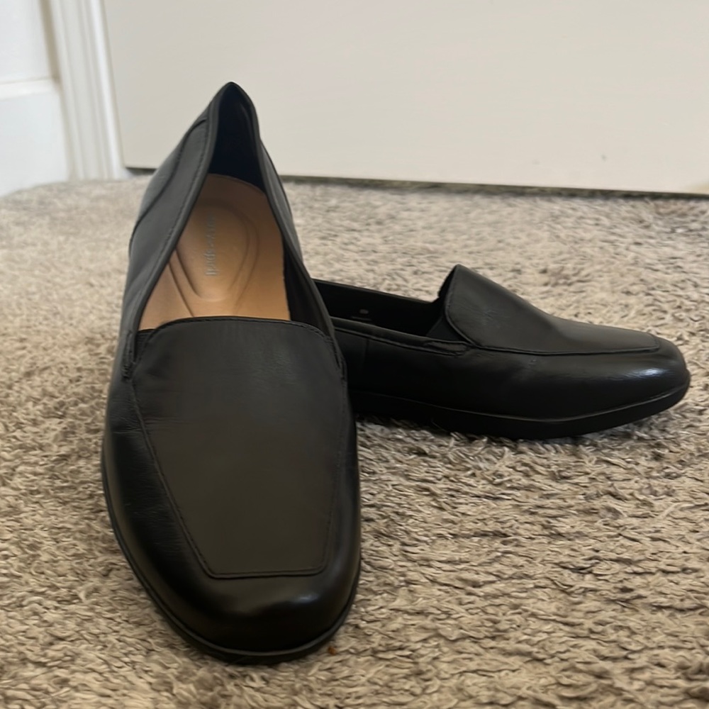 Black leather loafers in size 8M. Never used.